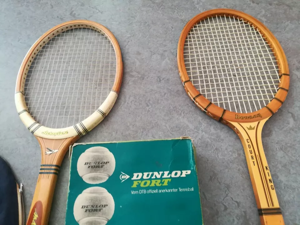 Was wird der Kunststoffstreifen oben auf einem Tennisschläger genannt?